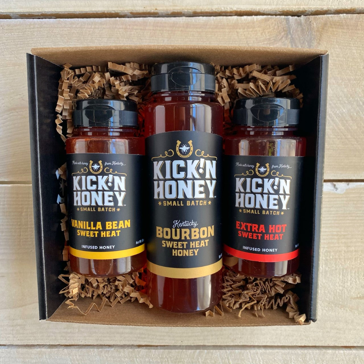 Our Kentucky Bourbon Hot Honey gift box is perfect for the bourbon lover. It features a 12oz. bottle of Kick'n Honey, Bourbon hot honey, plus an bottle of Vanilla Bean Hot Honey and Extra Hot Honey.